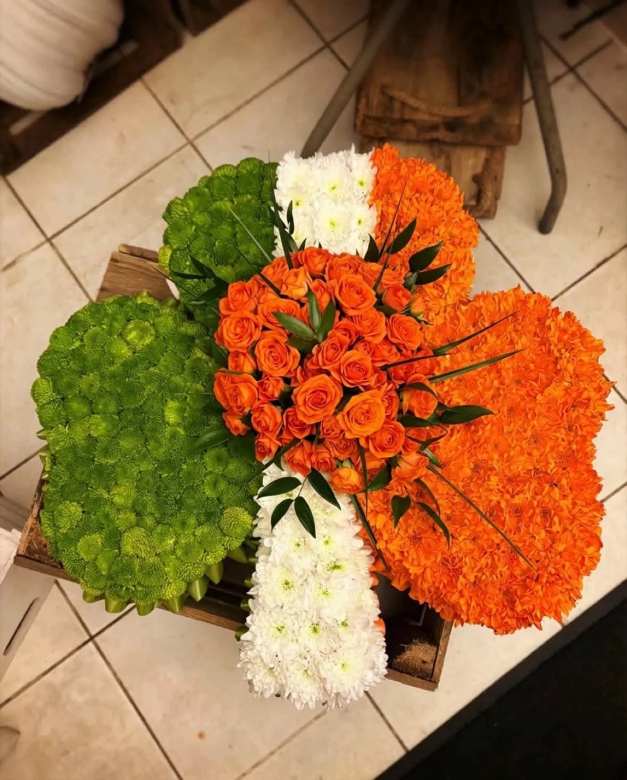 Bright mixed bouquet wrapped in orange